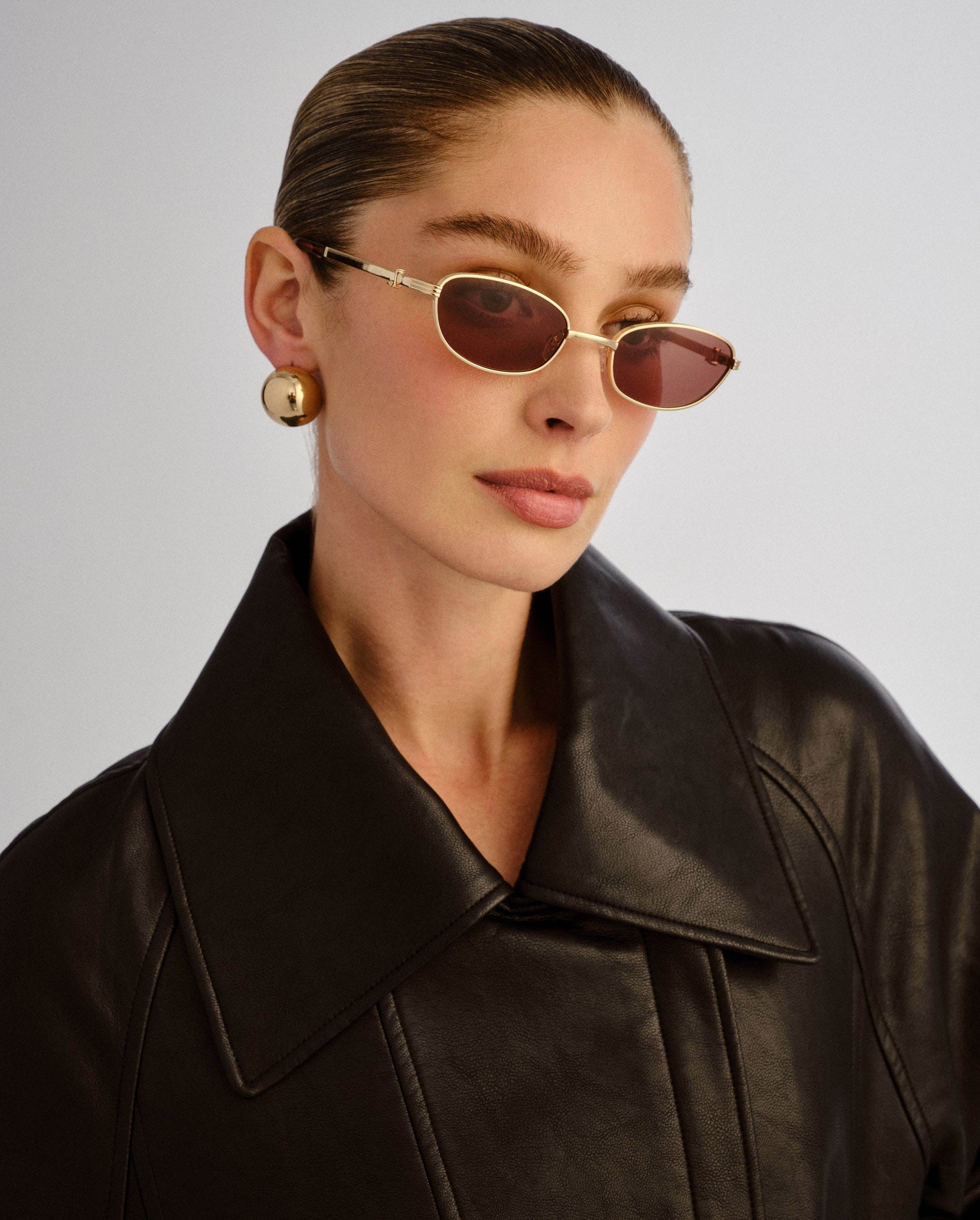 The Brooklyn Gold Female Oval Sunglasses | Luv Lou