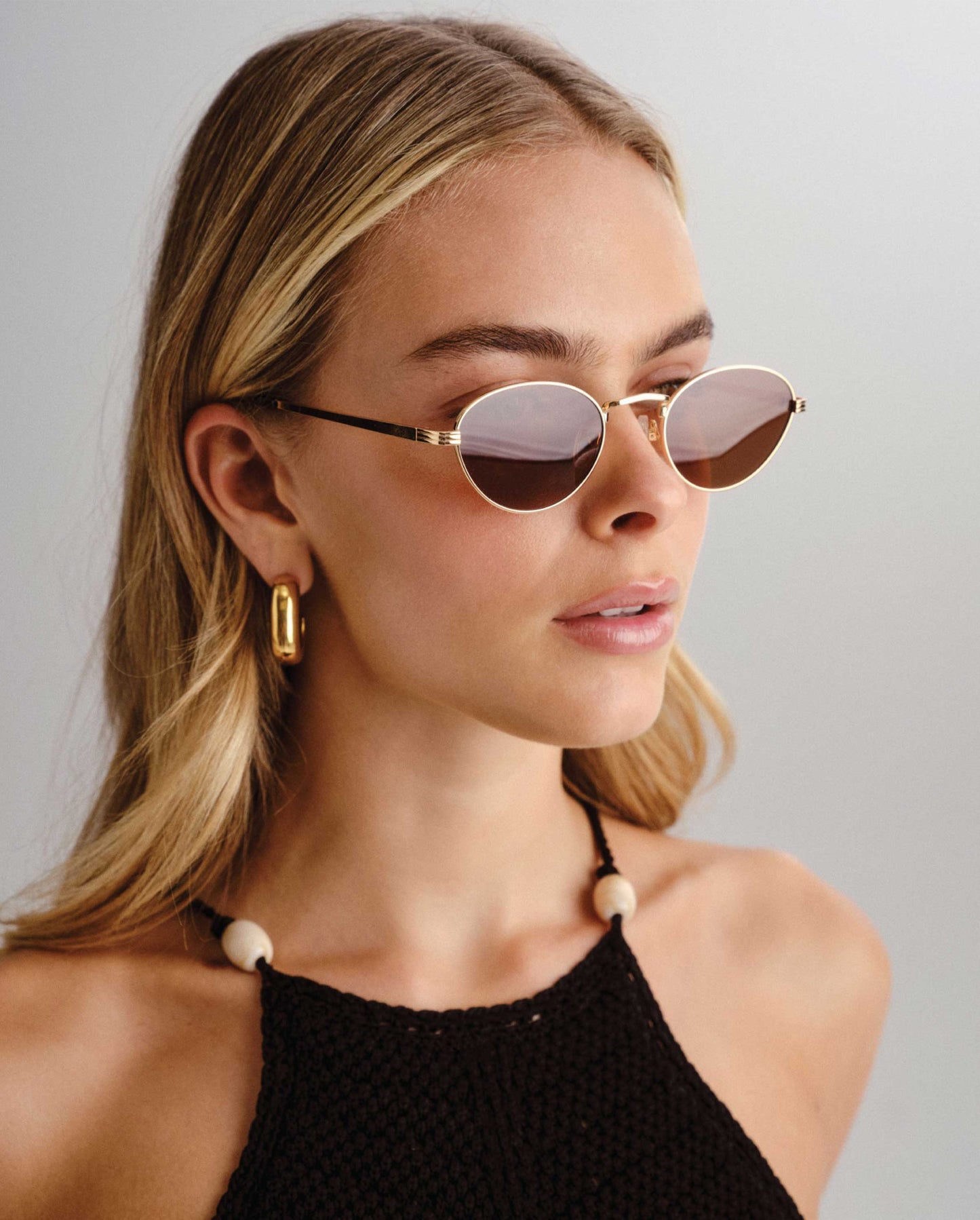 The Delilah Gold Female Oval Sunglasses | Luv Lou