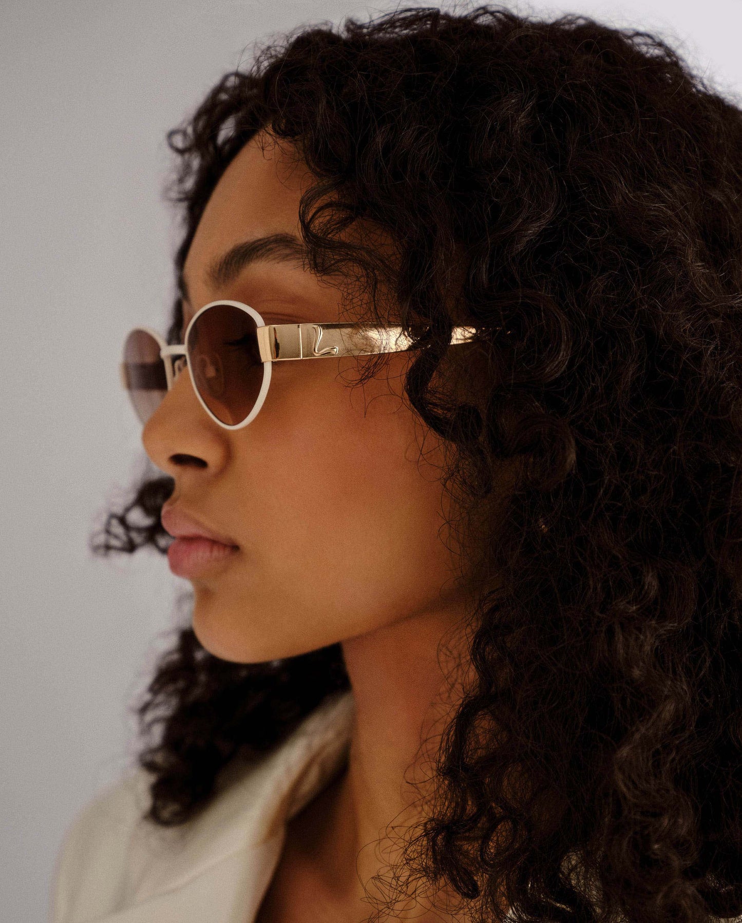 The Boston Ivory Female Oval Sunglasses | Luv Lou