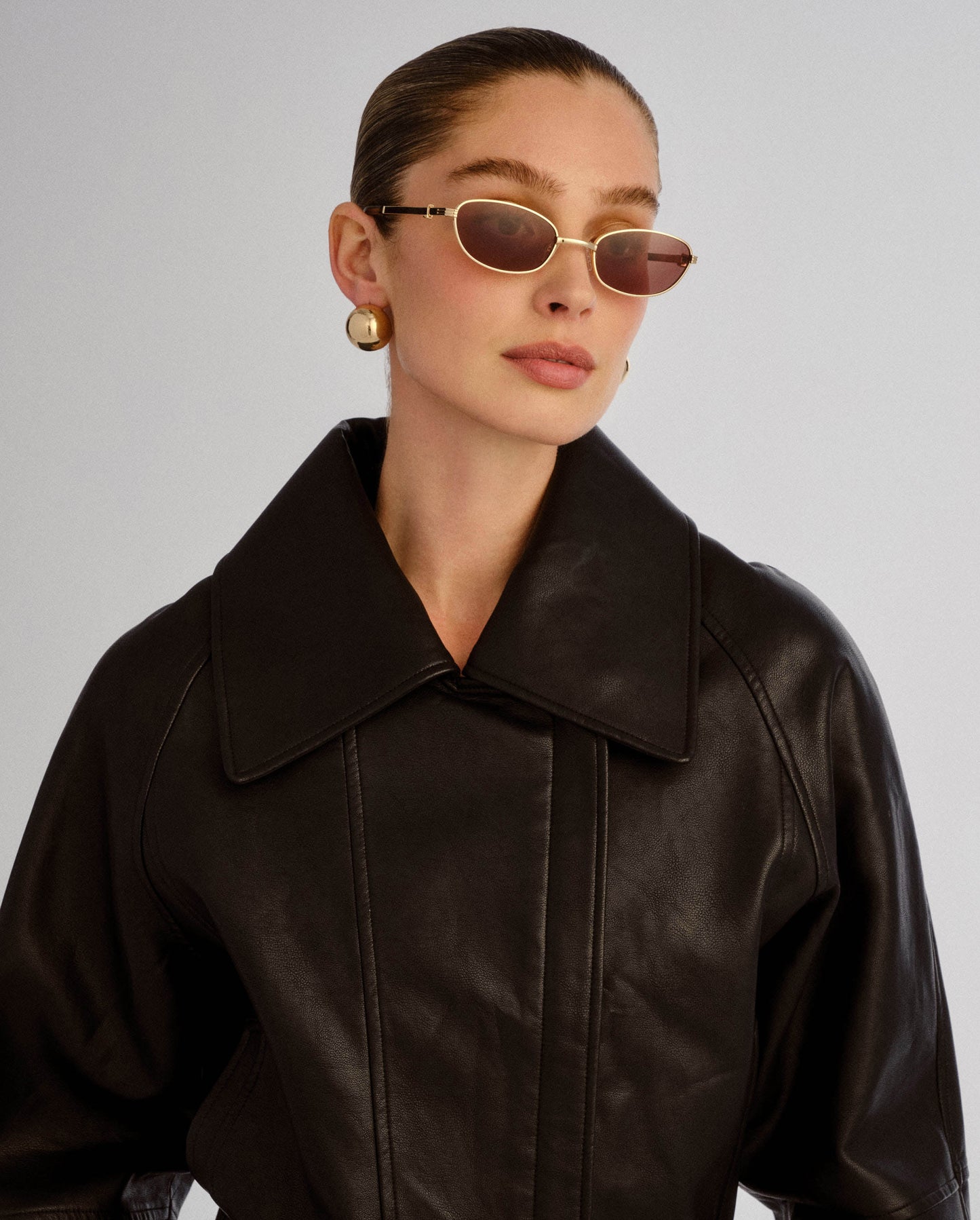 The Brooklyn Gold Female Oval Sunglasses | Luv Lou